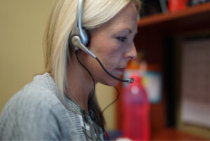 woman on call blonde nurse advice line and rn jobs company